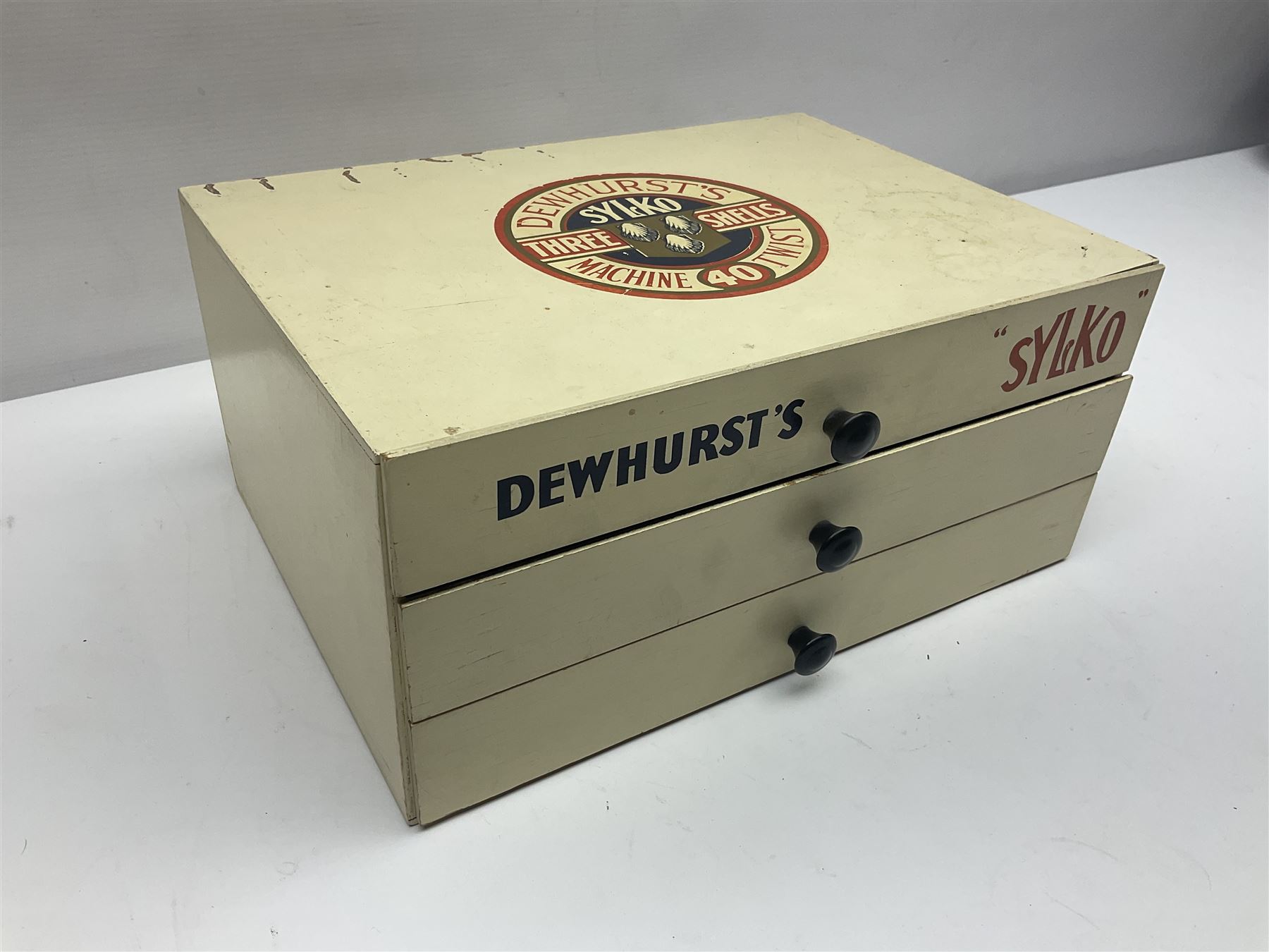 Mid 20th century Dewhurst's 'Sylko' advertising counter top three drawer chest, H14.5cm