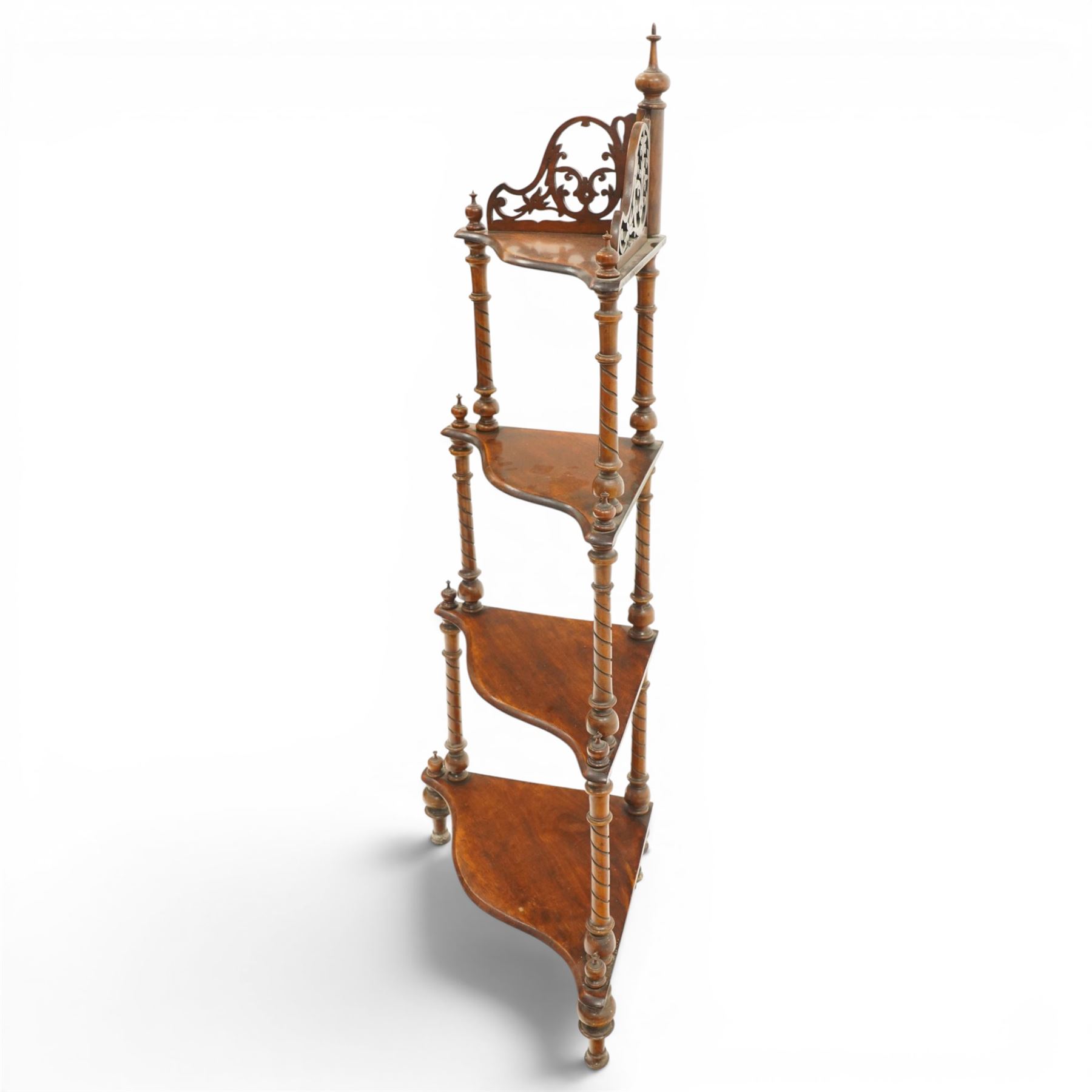 Victorian mahogany corner four-tier whatnot, shaped shelves with pierced and turned uprights, raised on turned supports