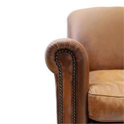 Pair of brown faux leather tub armchairs, scrolled arms with studded detail, turned front feet