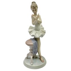 Lladro figure, For a Perfect Performance, modelled as a ballerina stood next to a stool, with original box, no 7641, year issued 1995, year retired 1995, H26cm 