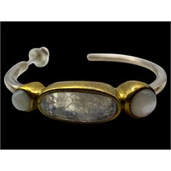 Six pairs of silver earrings, including opal pendant earrings and a pair of moonstone hoop earrings