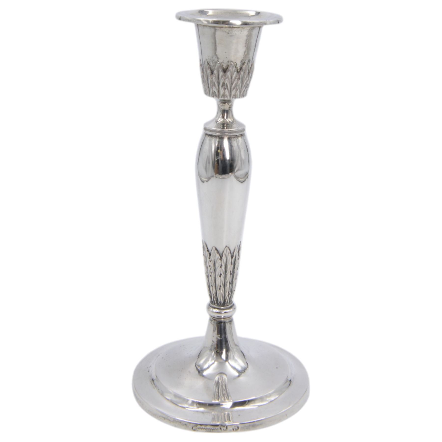 Pair of continental silver candlesticks, probably German Hanau, each of tapering form, with fern leaf decoration, upon a stepped circular base, with Hanau marks and assay scrape to base, H19cm