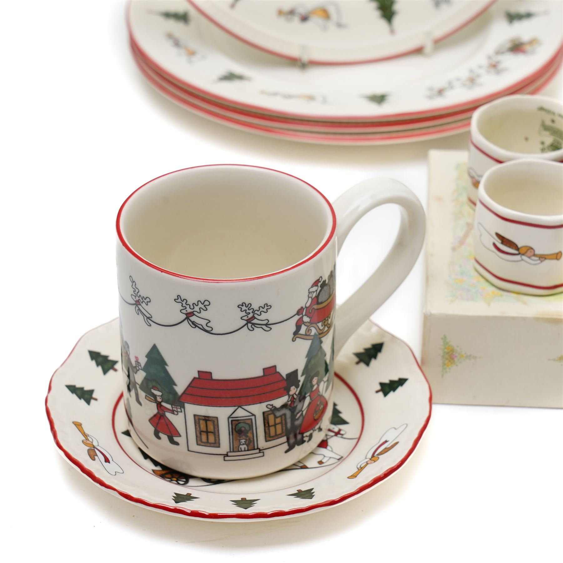 Masons Christmas Village dinner wares, designed by Marsten-Mandrajji, comprising three dinner plates, four lunch plates, tree shaped bon bon dish, serving platter, cake stand, napkin rings etc