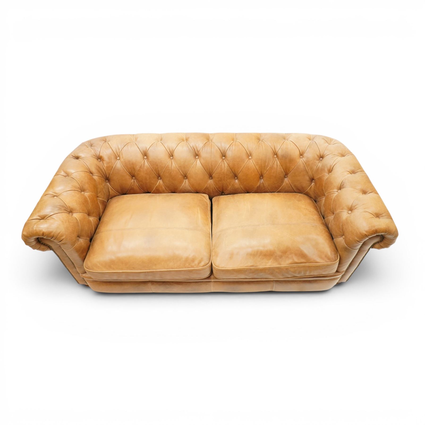 Alexander James - Chesterfield tan three seat sofa, button backed with scrolled arms, brass studded trim raised on light wood turned feet