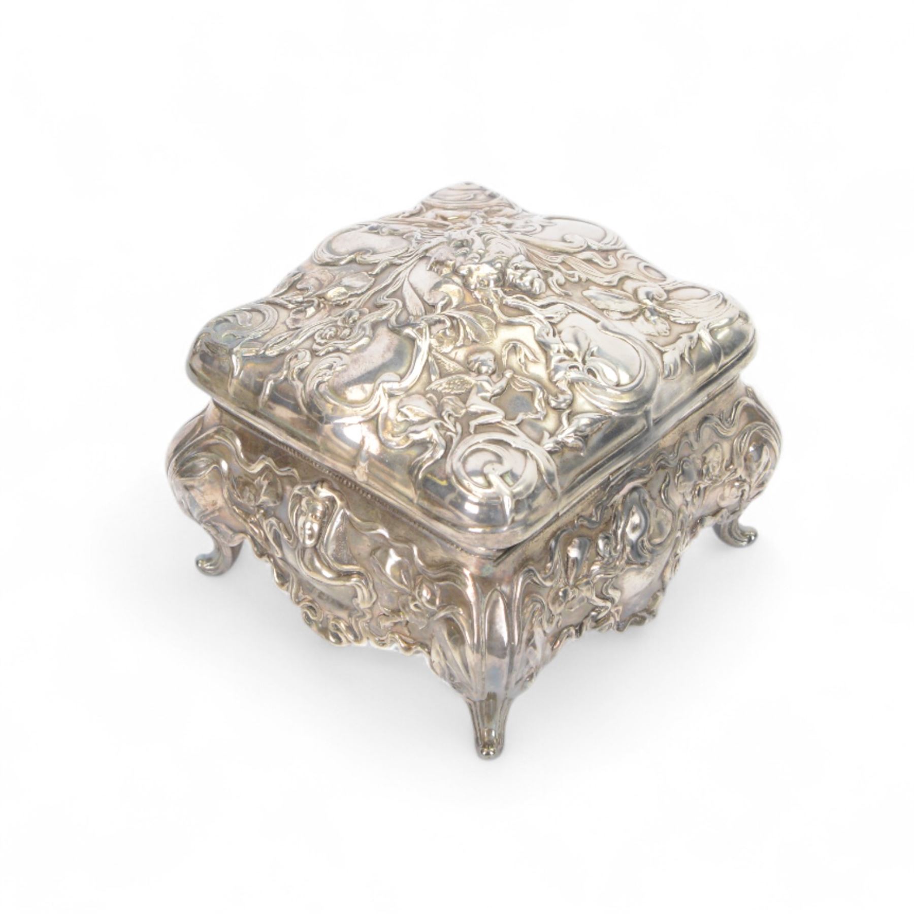 Derby Silver Co, Art Nouveau silver plate dressing table set, comprising mirror and two brushes, together with a silver silver plated box, the box marked B&W to the base, box H13cm