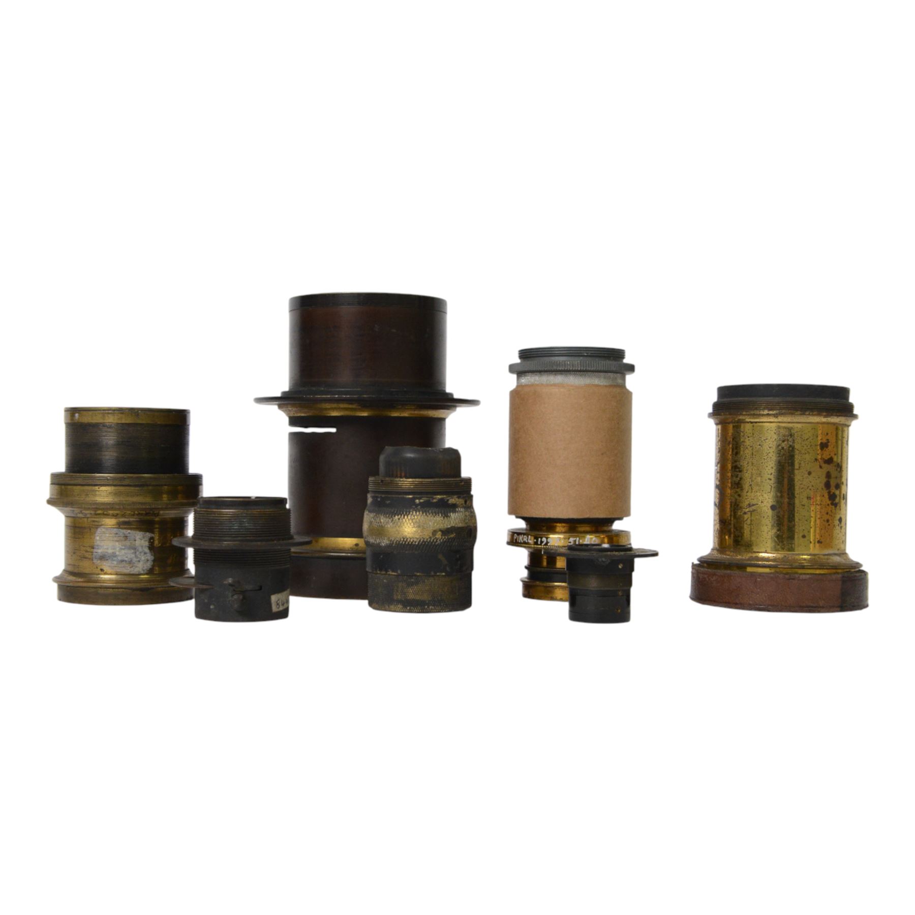 Seven 19th century and later brass camera lenses, including J. Lancaster & Son Rectigraph lens, Watson & Sons 8 1/2 x 6 1/2 lens, Dallmeyer lens and Wray London 5 x 4 lens