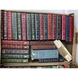 Collection of books, to include eight volumes of The Harmsworth Encyclopaedia, Dicken novels, readers digest books etc in five boxes