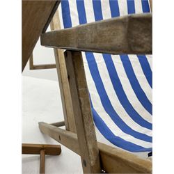 Geebro - ‘The Ocean Chair’ two vintage beech framed folding deck chairs with blue and white striped fabric 