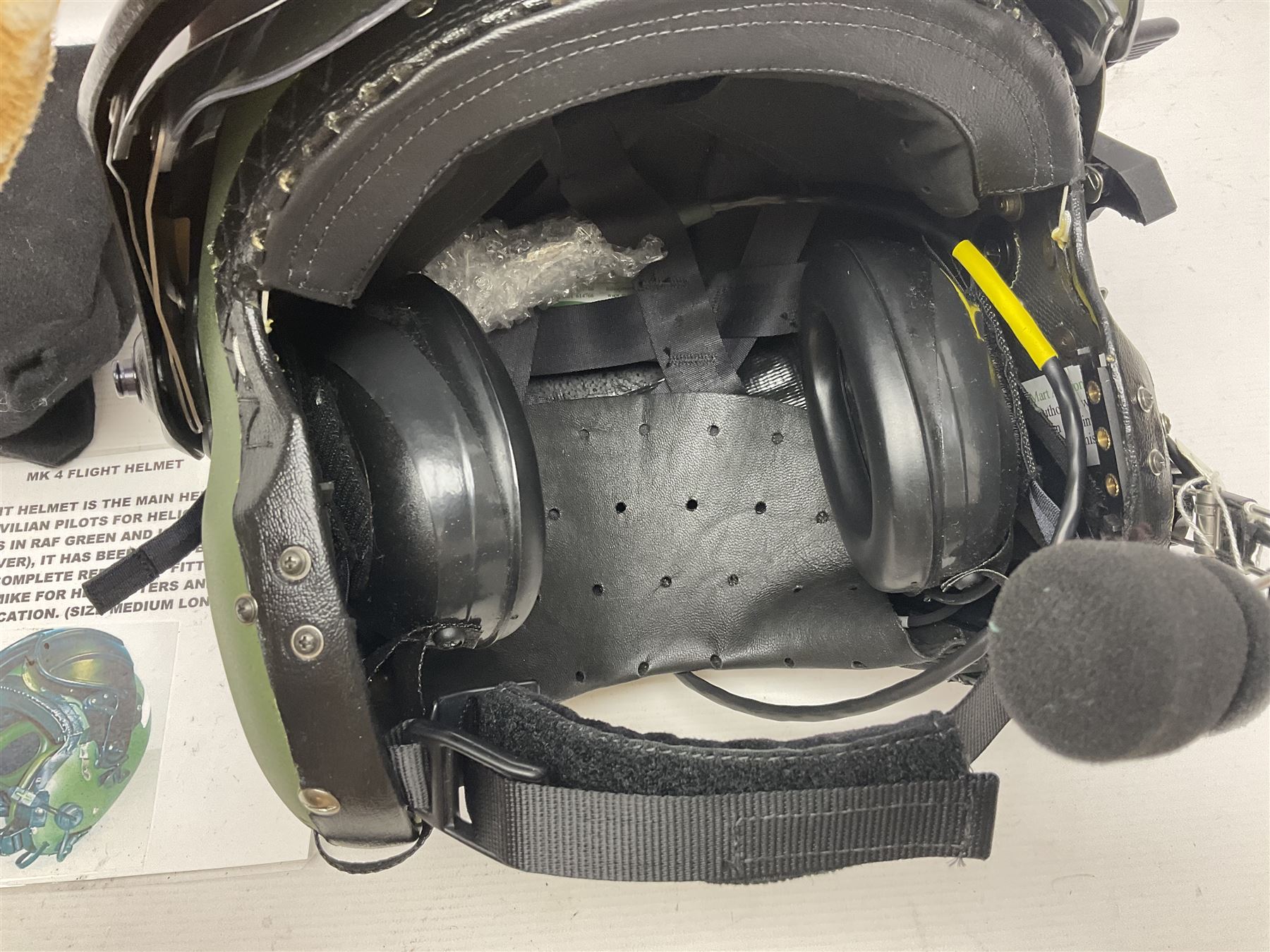 Mk.4 Flight Helmet, as used by RAF and Civilian helicopter pilots; in RAF green,  fitted with rigid visor cover and working boom mike; has had a complete refit and is bench tested.