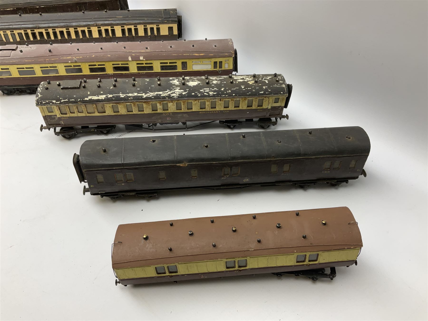 '0' gauge - eight early 20th century scratch-built coaches with GWR livery including three restaurant cars, newspaper van, luggage/guards van etc