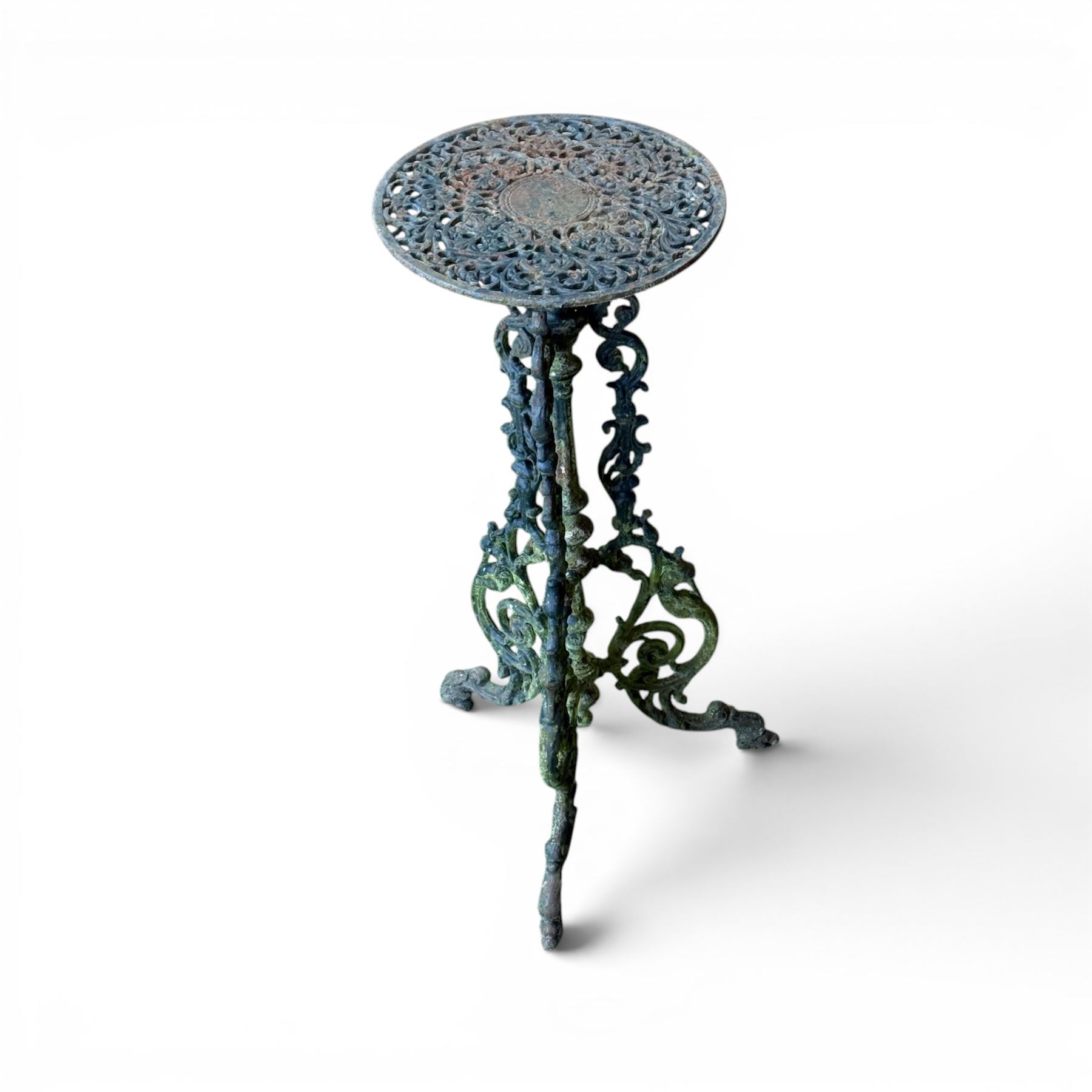 19th century ornate cast iron high garden drinks table, small circular pierced top, raised on three legged base