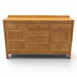 Mouseman - adzed oak dresser, fitted with six drawer and two cupboards, with carved mouse signature, by the workshop of Robert Thompson of Kilburn