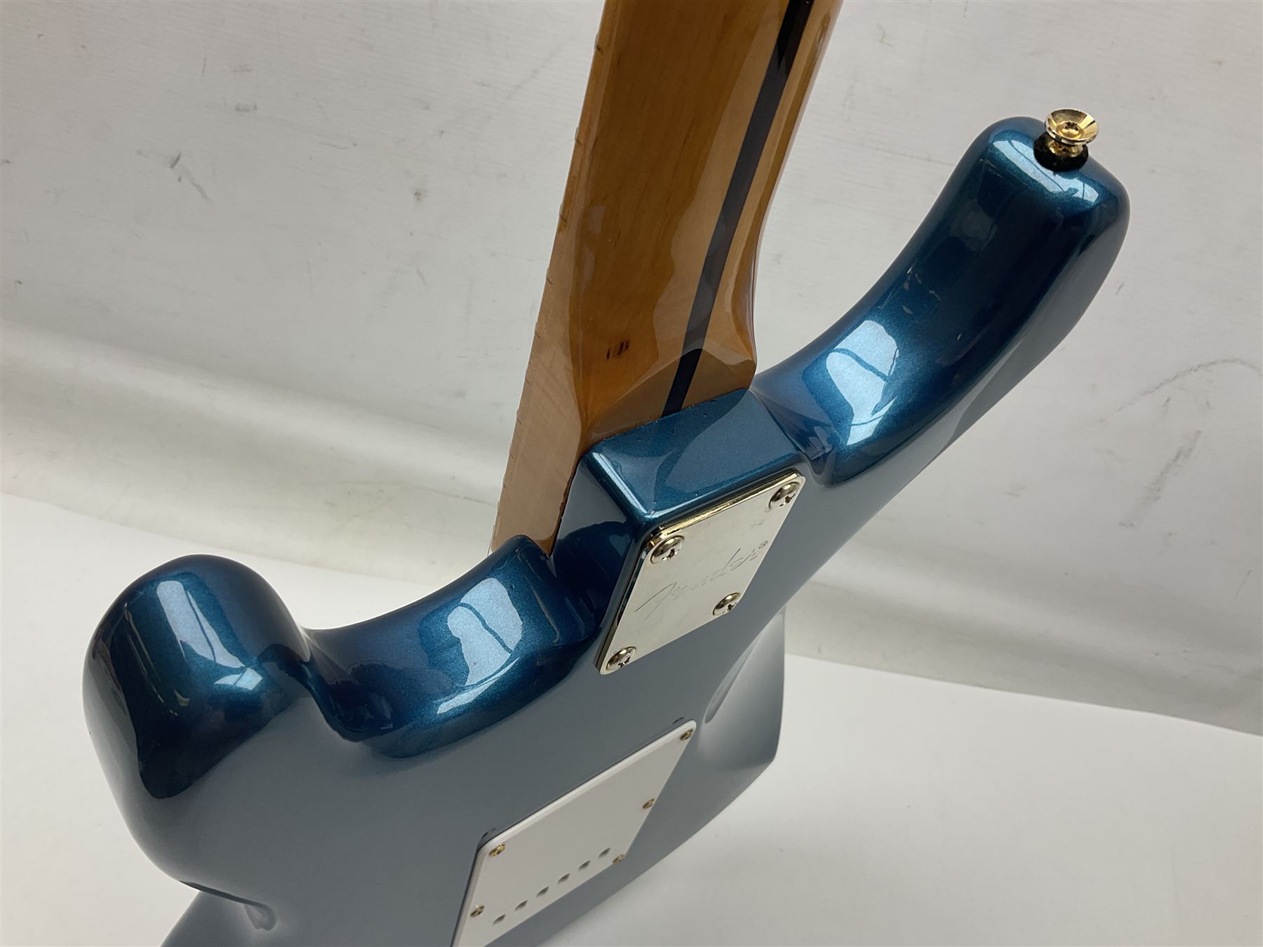 Fender Stratocaster style electric guitar in metallic blue with Rio Grande pick-ups and Fender back-plate L98cm; in Fender soft carrying case