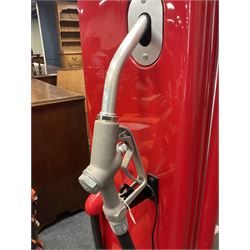 Roadside Relics Fender Custom Shop guitar display case, modelled as an American petrol pump, with a circular two-tone Fender logo light upon the pillar box red cabinet, three sides with glazed panels and chrome detailing, one etched with Fender logo, the interior with removable guitar stand, height including light 184cm