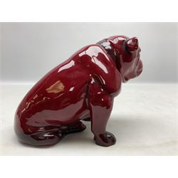 Royal Doulton Flambe figure of a Bulldog, modelled seated, model no 135, with printed maker's mark and K and impressed 135 beneath, H13.5cm