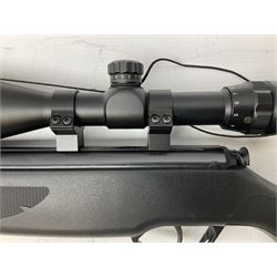 Stoegar .177 air rifle with break barrel action, 3 x 9 telescopic sight and fully integrated sound moderated barrel, no visible serial number, L109cm; in Stoeger lined gun sling