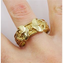 Heavy 9ct gold buckle ring with engraved foliate decoration, London 1987