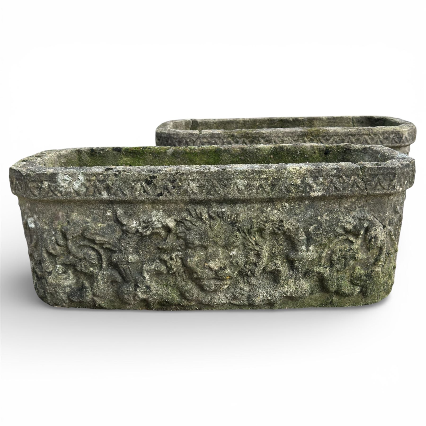Two cast stone planters / troughs with lion emblems