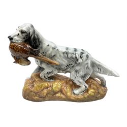 Royal Doulton model of an English setter carrying a pheasant, HN 2529, designed by Frederick Daws H21cm