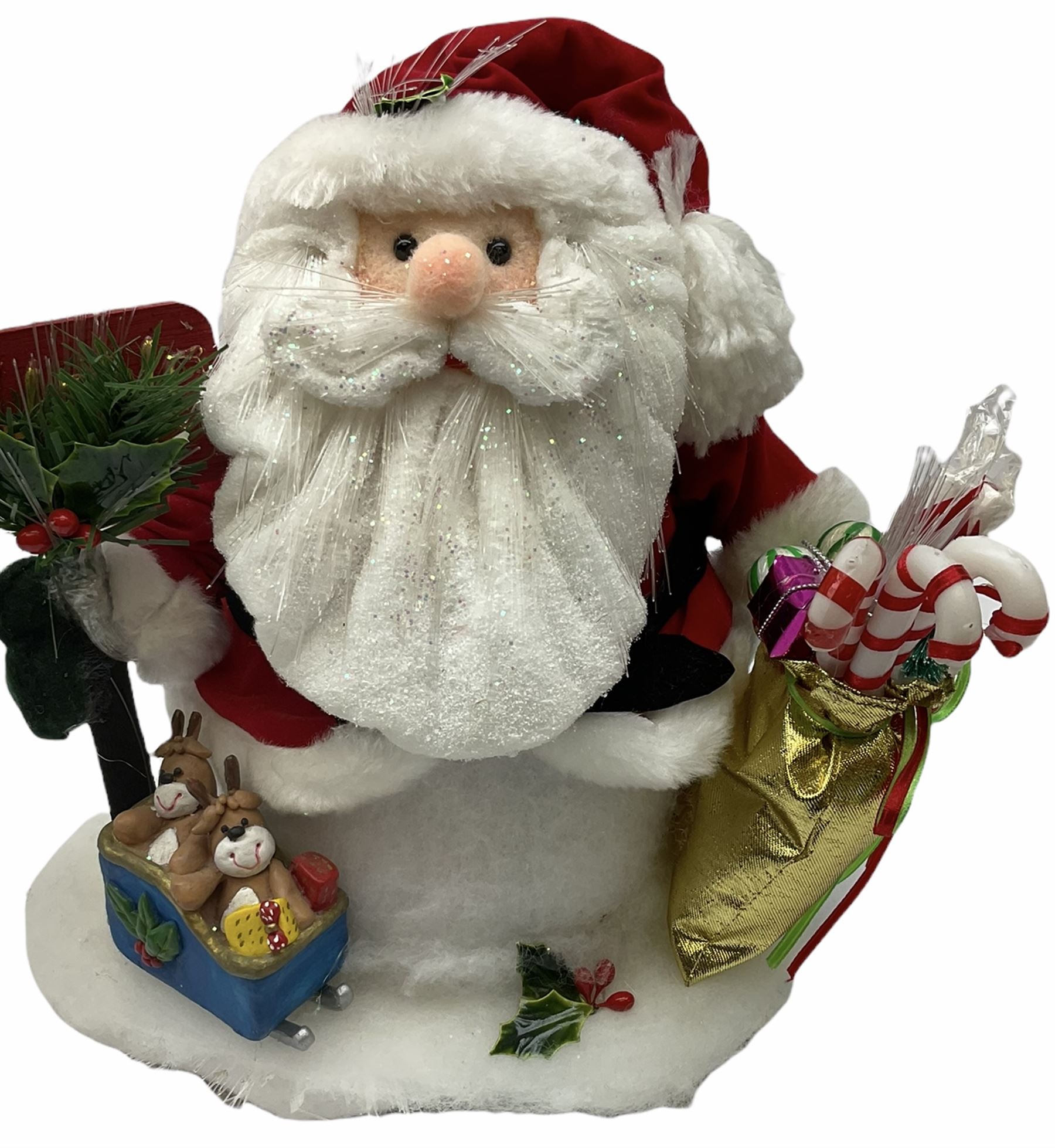 A collection of illuminating Christmas decorations, including Hawthorne Village decorations by Thomas Kinkade, Candle holders Winter Wonderland, a wreath candleholders Holiday Gathering, Village Christmas illuminated tree sculpture H39cm and Santa's on his Way, along with A Very Beary Christmas illuminated tree 33cm, and three other illuminating Christmas decorations, all with plugs. 