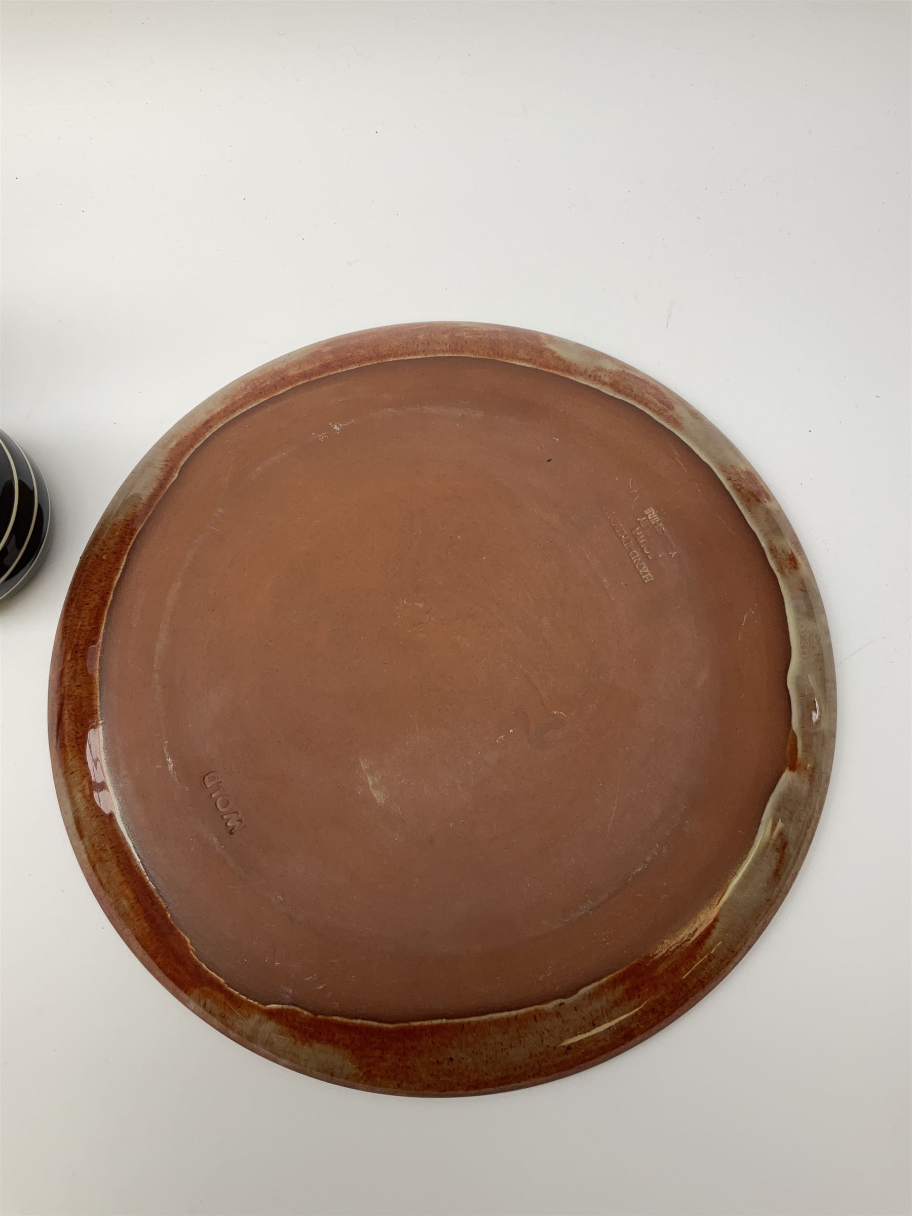 A group of assorted Studio Pottery, to include various Cornish Celtic Pottery, Wold pottery bowl, Micklegate pottery bowl, a small Troika style vase of cylindrical form, etc. 