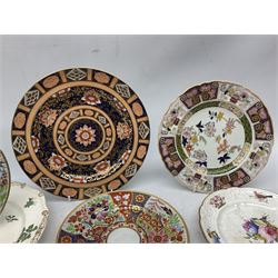 Group of 19th century plates, to include a Rockingham example with green transfer printed decoration of rose, thistle and clover springs, three Mason's examples including one decorated in the Imari palette, a Davenport example also decorated in the Imari palette, etc. 