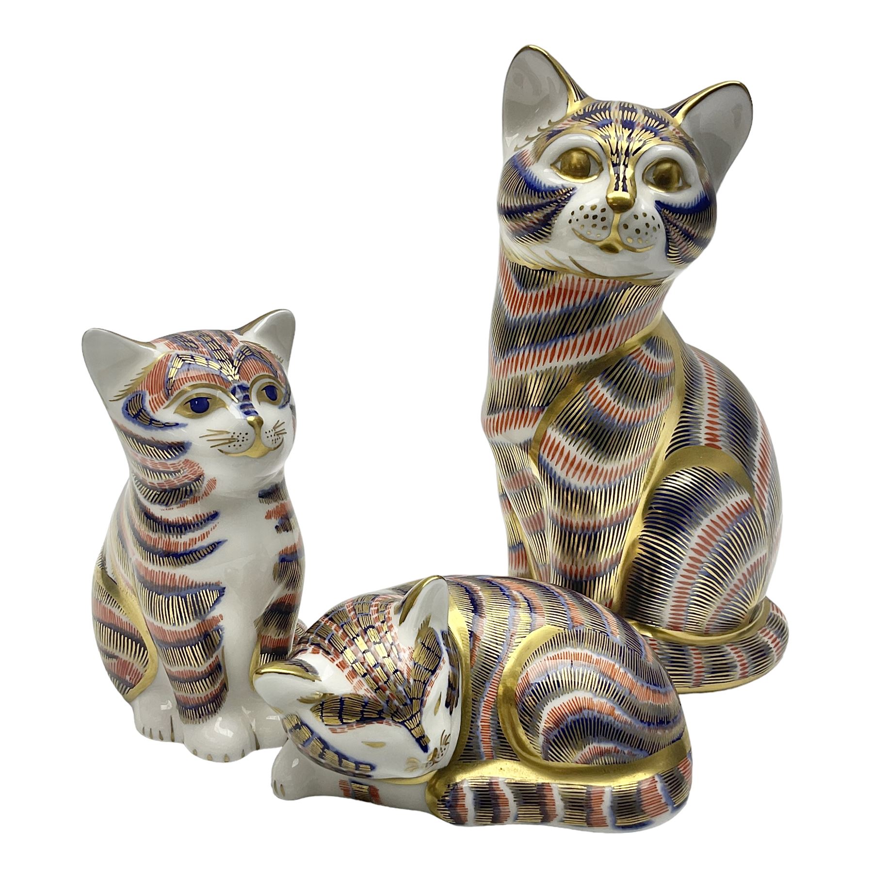 Three Royal Crown Derby paperweights, comprising of three cats, all with gold stoppers and printed mark beneath 