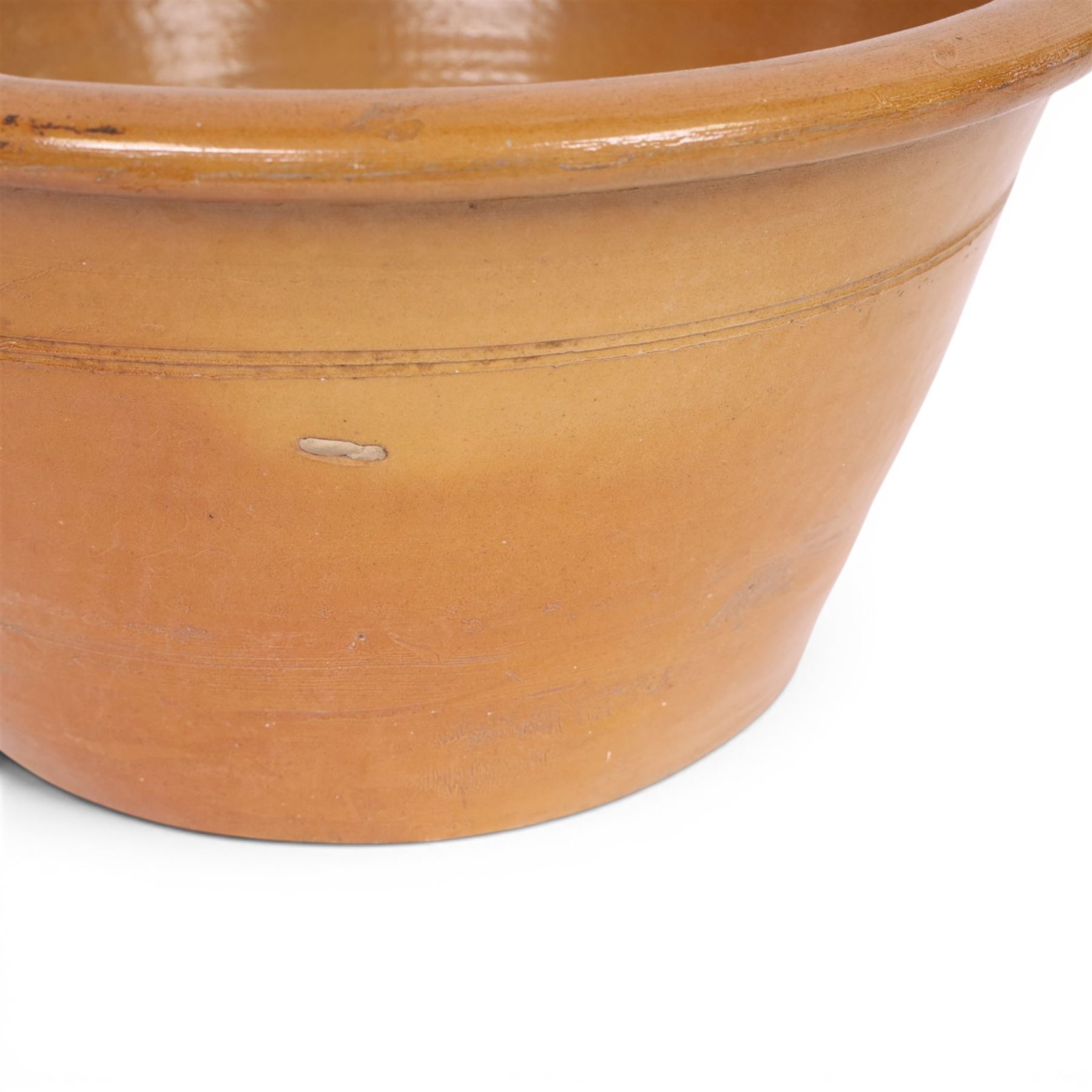 19th century tan twin handled pancheon, of tapering circular form, H26cm, D51cm