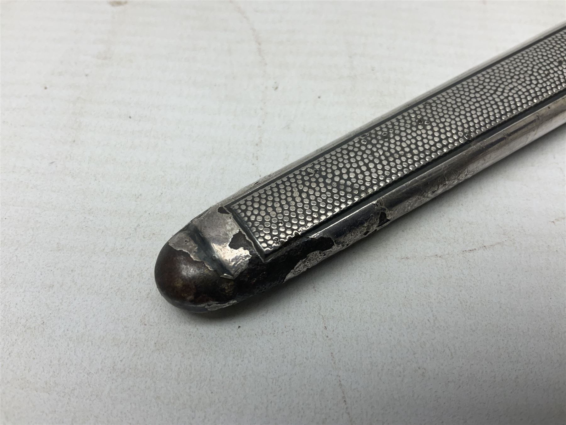 Late WW2 German Army Officers dress dagger, with unmarked 25cm double edged steel blade, orange celluloid grip, pommel and ferrule with oakleaves relief and cross guard with eagle; in original beaded scabbard with two hanging rings L39.5cm overall