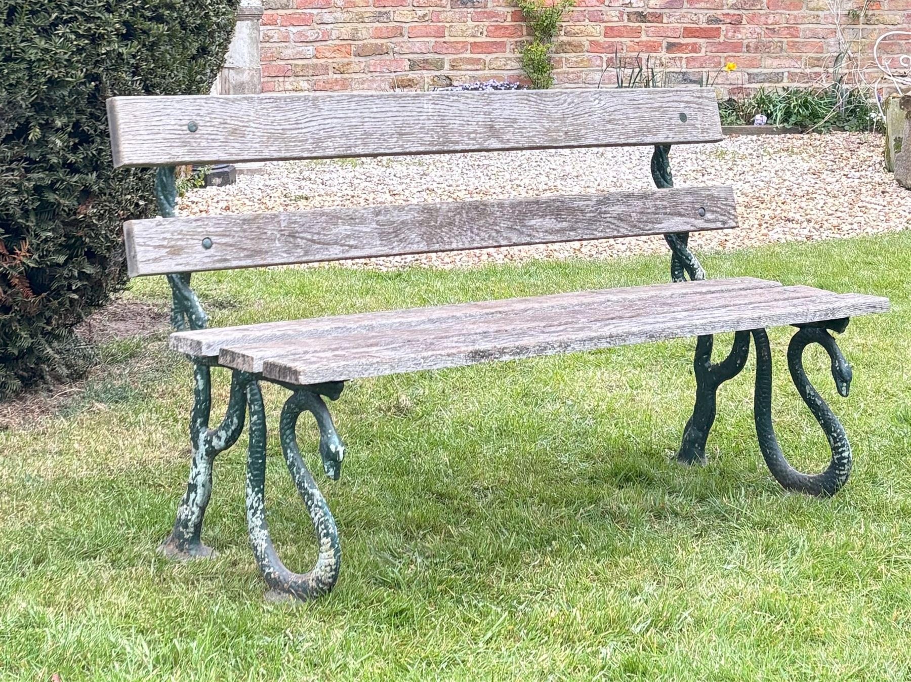 Carron pattern snake end garden bench with teak slats. L144cm, H80cm, D50cm.  - COLLECTION BY APPOINTMENT FROM: The White House, Thirsk Road, Easingwold, York, YO61 3NF - CALL 01723 507111 TO ARRANGE
