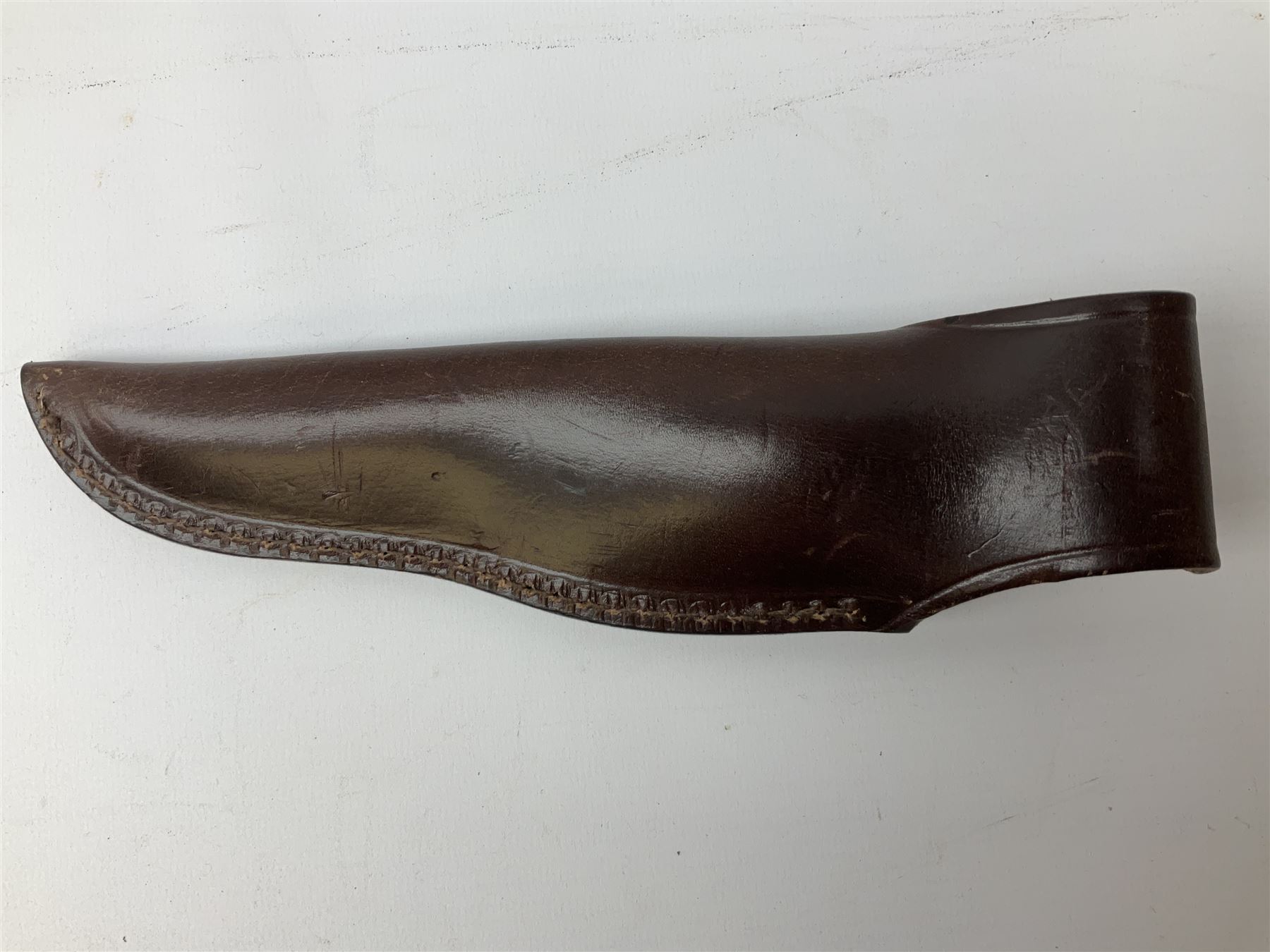 Three hunting knives, each blade marked A. Wright & Sons Sheffield, one with leather handle, one with horn handle and one with antler handle; each with leather sheath (3)