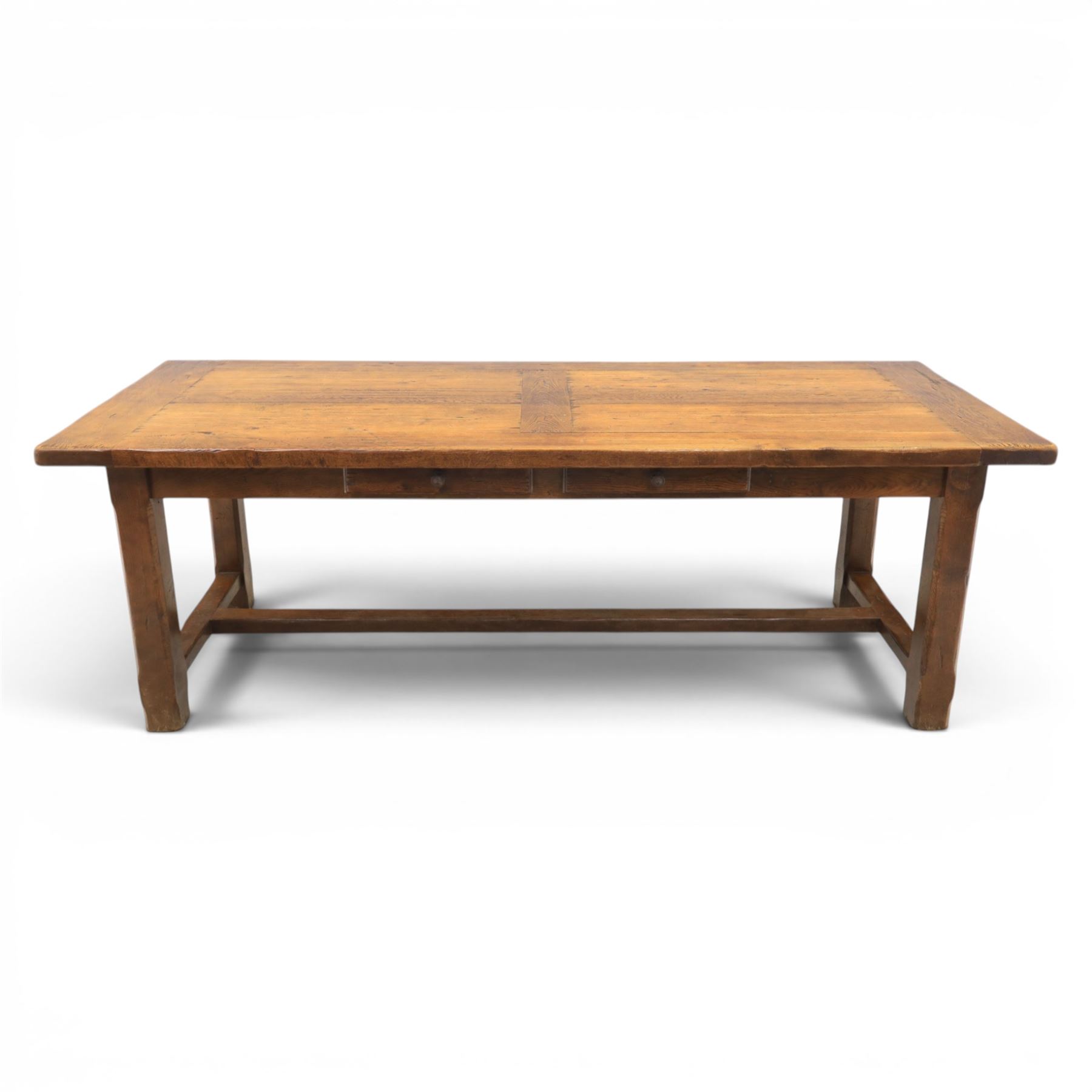 Country pine draw leaf table, bench seat and six chapel chairs, the top of plank construction, with two frieze drawers, additional leaves extending to 320cm, with bench seat and six elm chapel seats