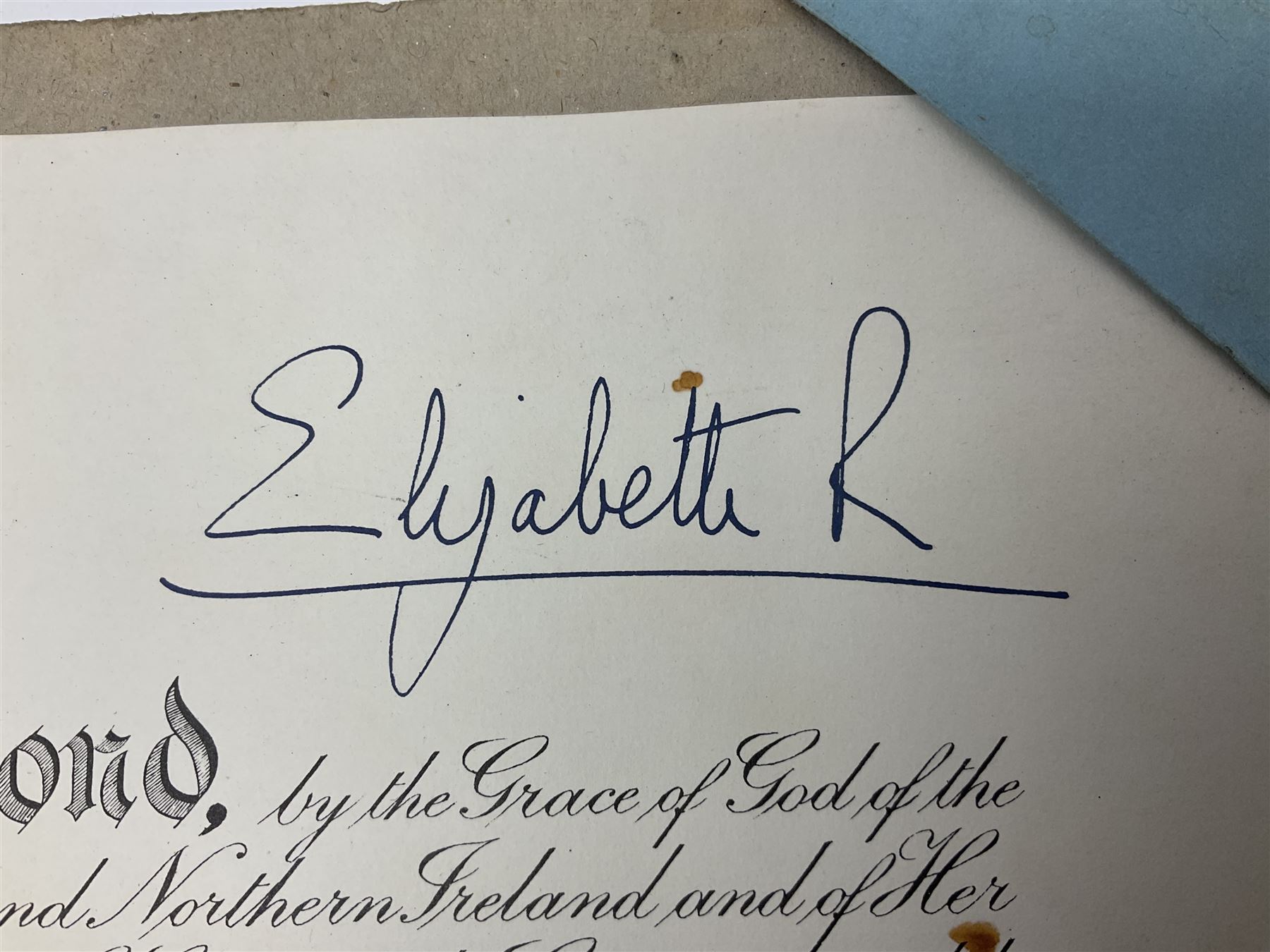 George VI Knight of the Garter cloth beret insignia with pin back and photograph of the Knight's Robes; Edmund Fellowes book on The Knights of the Garter 1348-1939; together with EIIR civilian OBE certificate to Jeffery Stanford Agate with facsimile signatures of Elizabeth II and Prince Philip