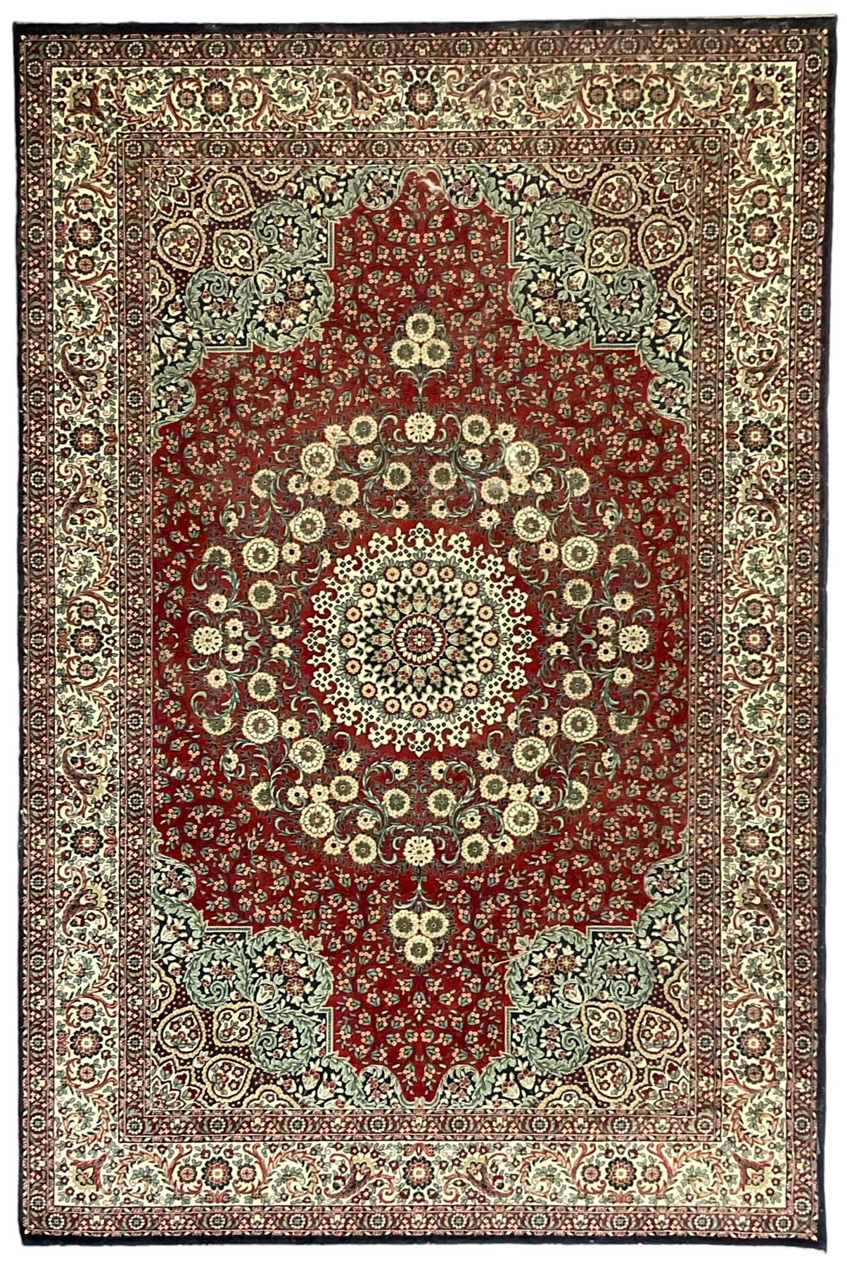 Persian design crimson ground carpet, the central rosette medallion surrounded by scrolling leaves and flower heads, the spandrels decorated with floral design and scrolling foliage, repeating border within guard stripes
