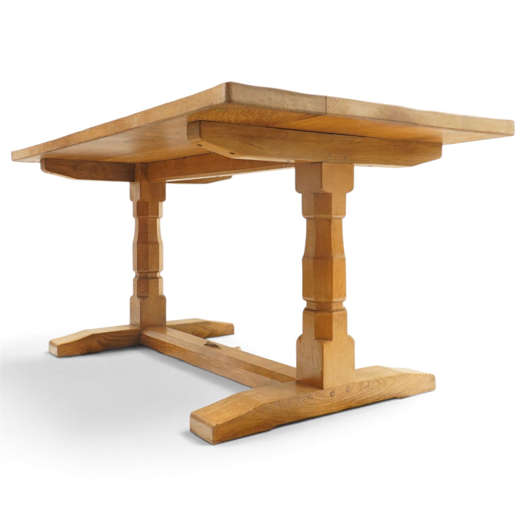 Lizardman - 5' oak refectory dining table, rectangular adzed top, octagonal turned supports united by stretcher with carved lizard signature, by Derek Slater of Crayke
