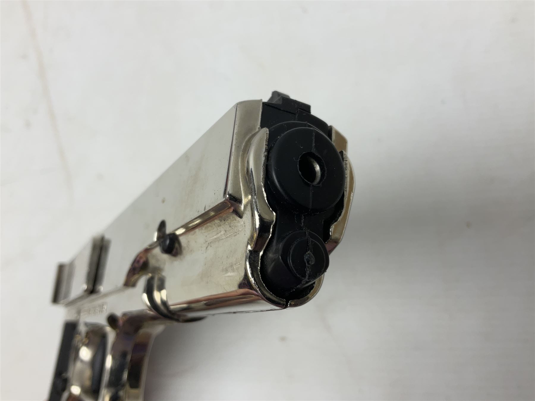 G-10 .177 20-shot BB Repeater air pistol with deluxe nickel plated finish; boxed with instructions