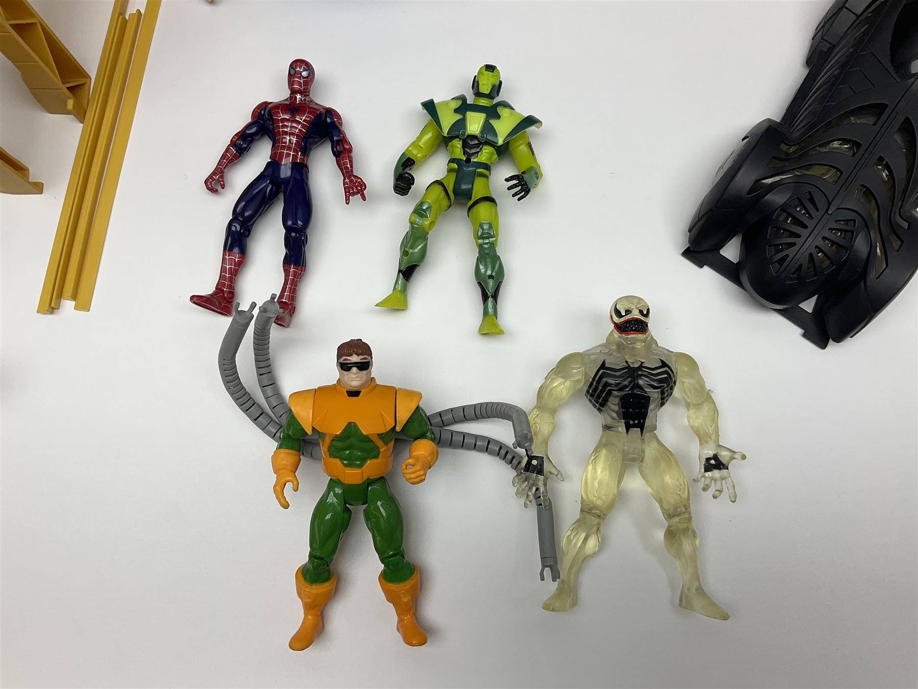 Group of early 90s Marvel/DC Comics toys; 1993 Kenner Batmobile with original Batman figure and plane; Marvel Comics Spider-Man 1994 Web of Steel series Hobgoblin Wing Bomber, incomplete Daily Bugle Playset and Scorpion; assorted figurines and later accessories 