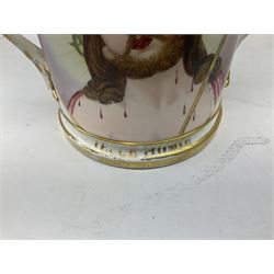 19th century loving cup, with a gilt rim and writing, decorated with religious iconography, H14cm