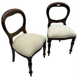 Pair of Victorian design mahogany bedroom chairs, balloon back over overstuffed seats upholstered in ivory fabric, on turned supports