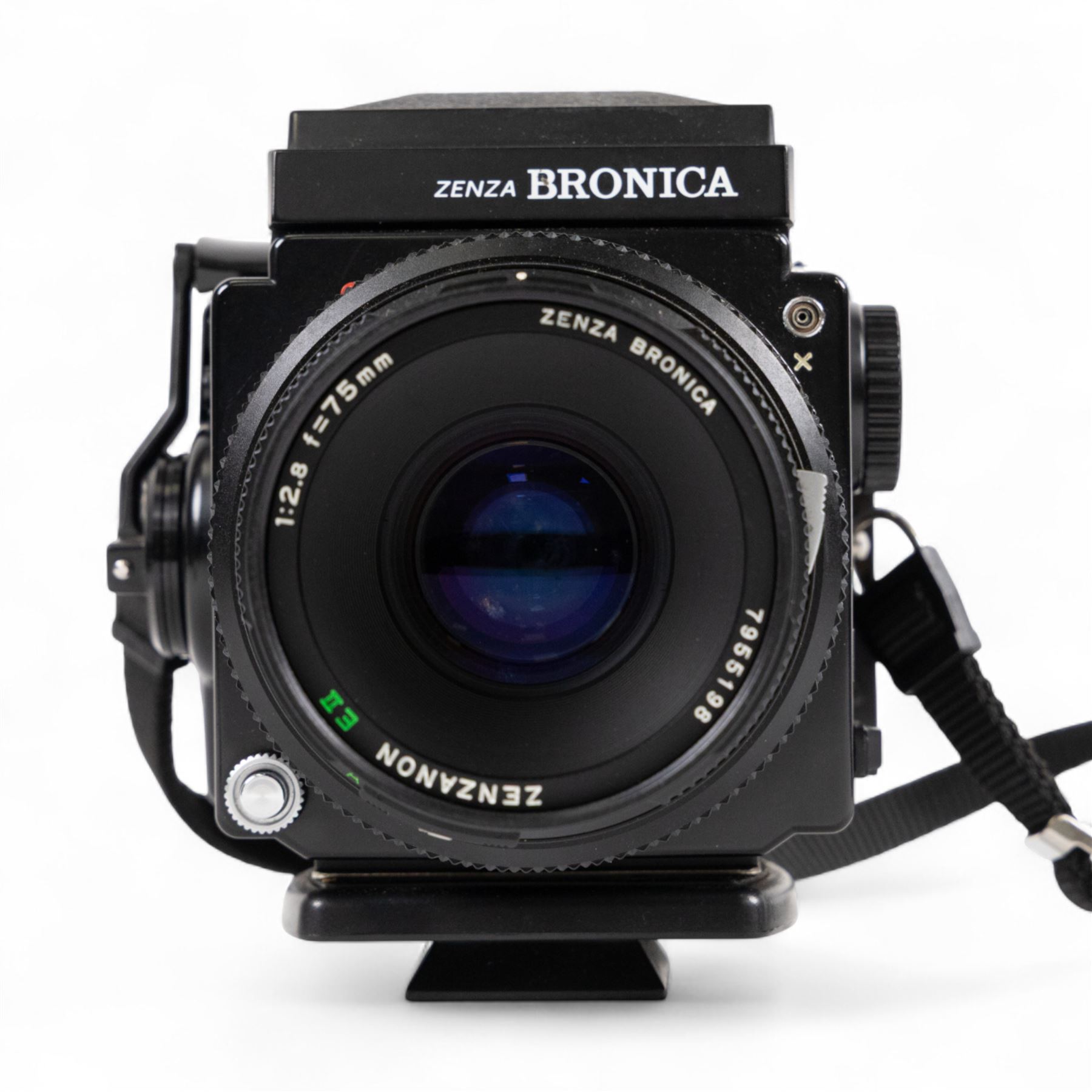 Zenza Bronica ETRS medium format camera, serial no. 8301079, with Zenza Bronica Zenzanon EII 1:2.8 f=75mm lens with lens cap, serial no. 7955198 and two film backs and instruction booklet