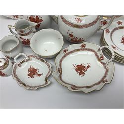 Herend Chinese Bouquet Rose pattern tea service comprising teapot, coffee pot, open sucrier, six cups and saucers, six tea plates, cream jug and stand, milk jug, two teabag holders, preserve pot, two leaf shaped dishes, four egg cups, salt & pepper pots, pair side plates and another plate