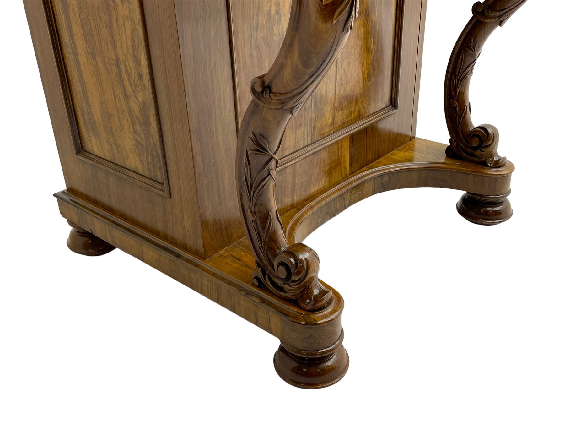 Fine and unusual 19th century olivewood piano top davenport, raised shaped back carved with olive branches and olives, the top hinges to reveal lidded and correspondence compartments, the piano lid enclosing sliding top with hinged and adjustable writing surface with leather inset, right-hand panelled door enclosing four drawers, olive branch and scroll carved cabriole front supports on moulded and shaped platform, turned cup feet with recessed castors 