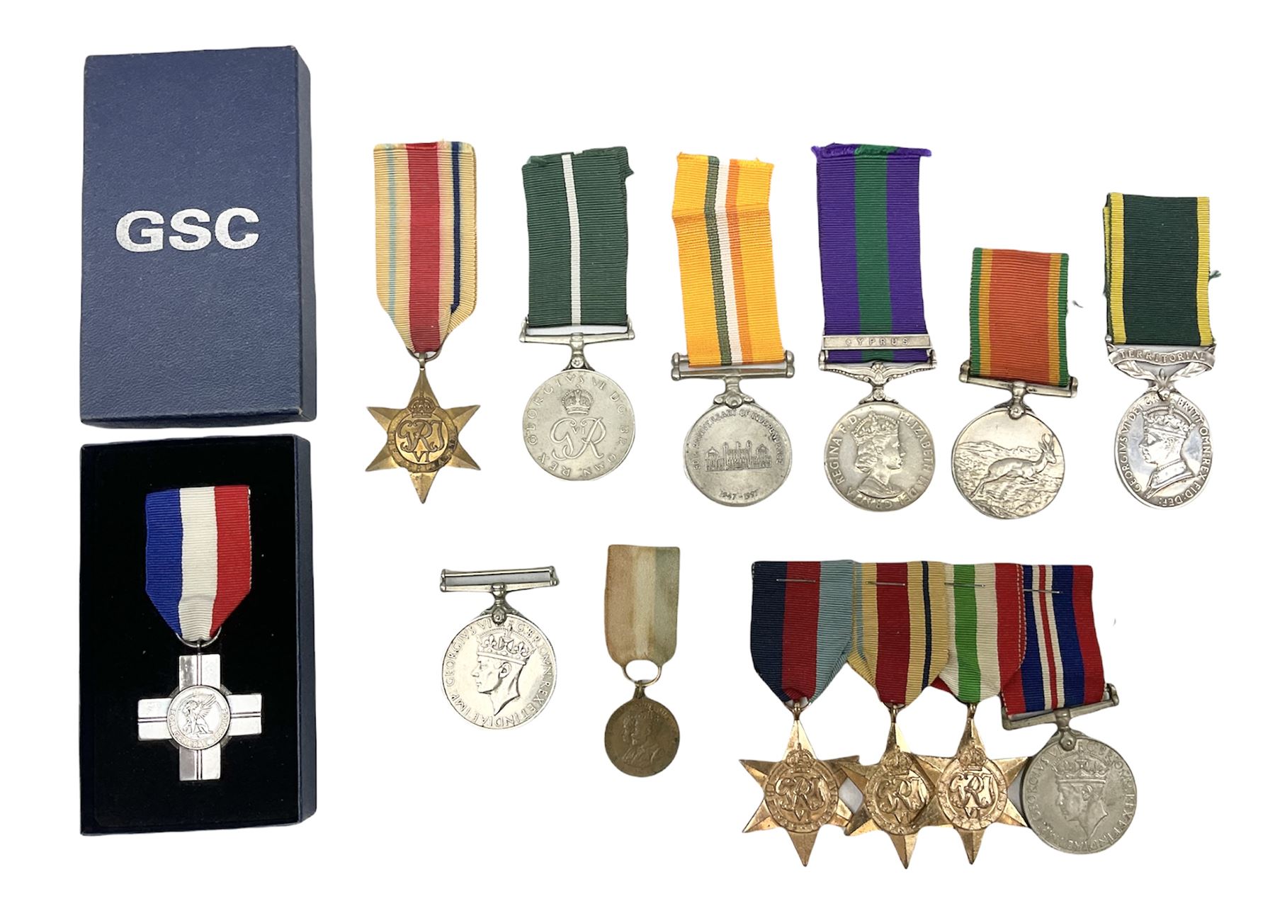 QEII General Service Medal awarded to 23504634 CFN. R.G. Beech REME; Pakistan Independence Medal awarded to Nadir Khan F.C.330; India Independence 50th anniversary medal; and a quantity of WW2 and later medals including Territorial Efficiency Medal awarded to 6196646 Gnr. J.G. Oatway R.A. (13)