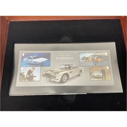 Danbury Mint 'The Ultimate James Bond Collection' comprising stamps and coins housed in a display case, 'Concorde Queen of the Skies' sculpture, stamps, medallion display and 2020 'Centenary of the Unknown Warrior' five pound coin cover in Harrington and Byrne folder