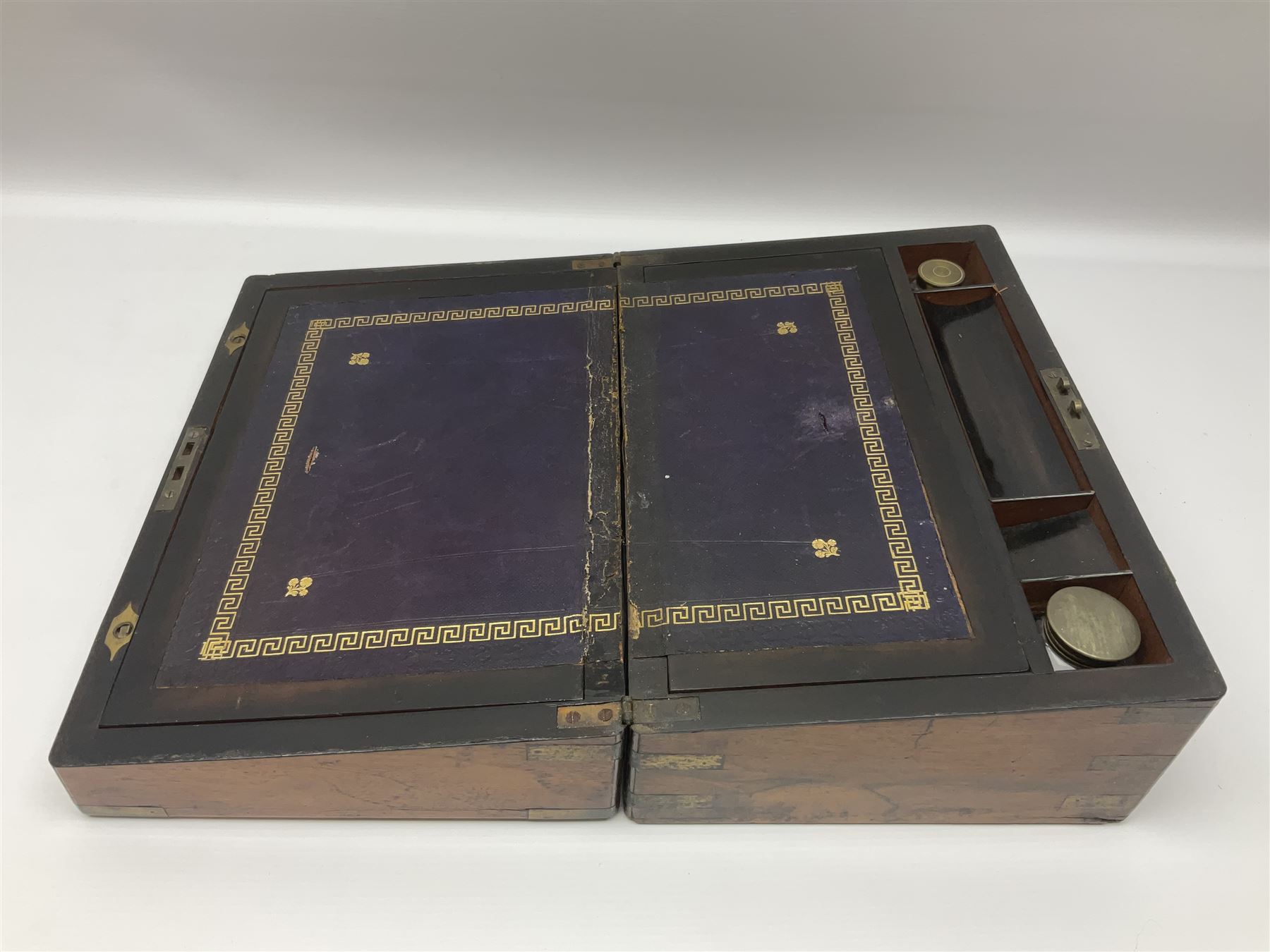 Victorian mahogany writing slope, the brass bound hinged cover opening to reveal tooled leather and gilt interior with two glass inkwells, together with a similar parquetry inlaid writing slope, with central mother of pearl inlay enrgraved 'Sarah', tallest H17cm 