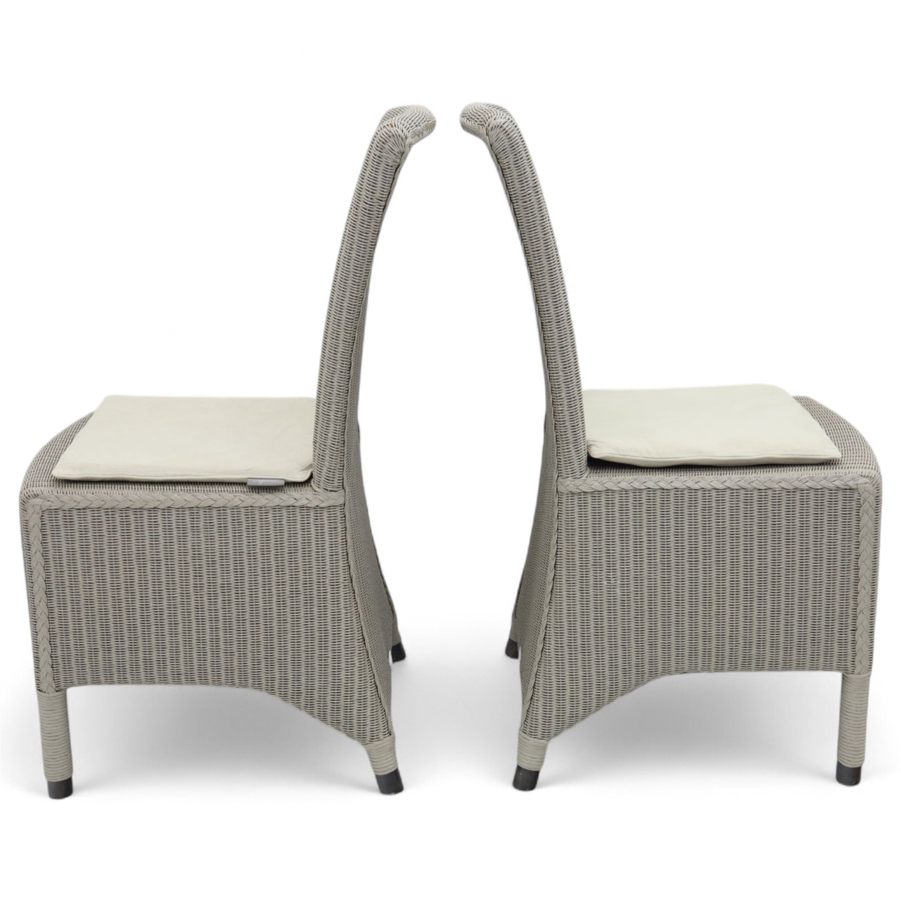Neptune – Sheldrake limed oak extendable dining table and eight Havan loom chairs, the oval top in limed oak finish with four additional leaves extending the table to seat up to ten (Extends to cm), raised on turned legs with two additional centre supports, the matching Havan loom chairs finished in grey with cream upholstered seat covers (H 95cm, W 47cm, D 55cm)