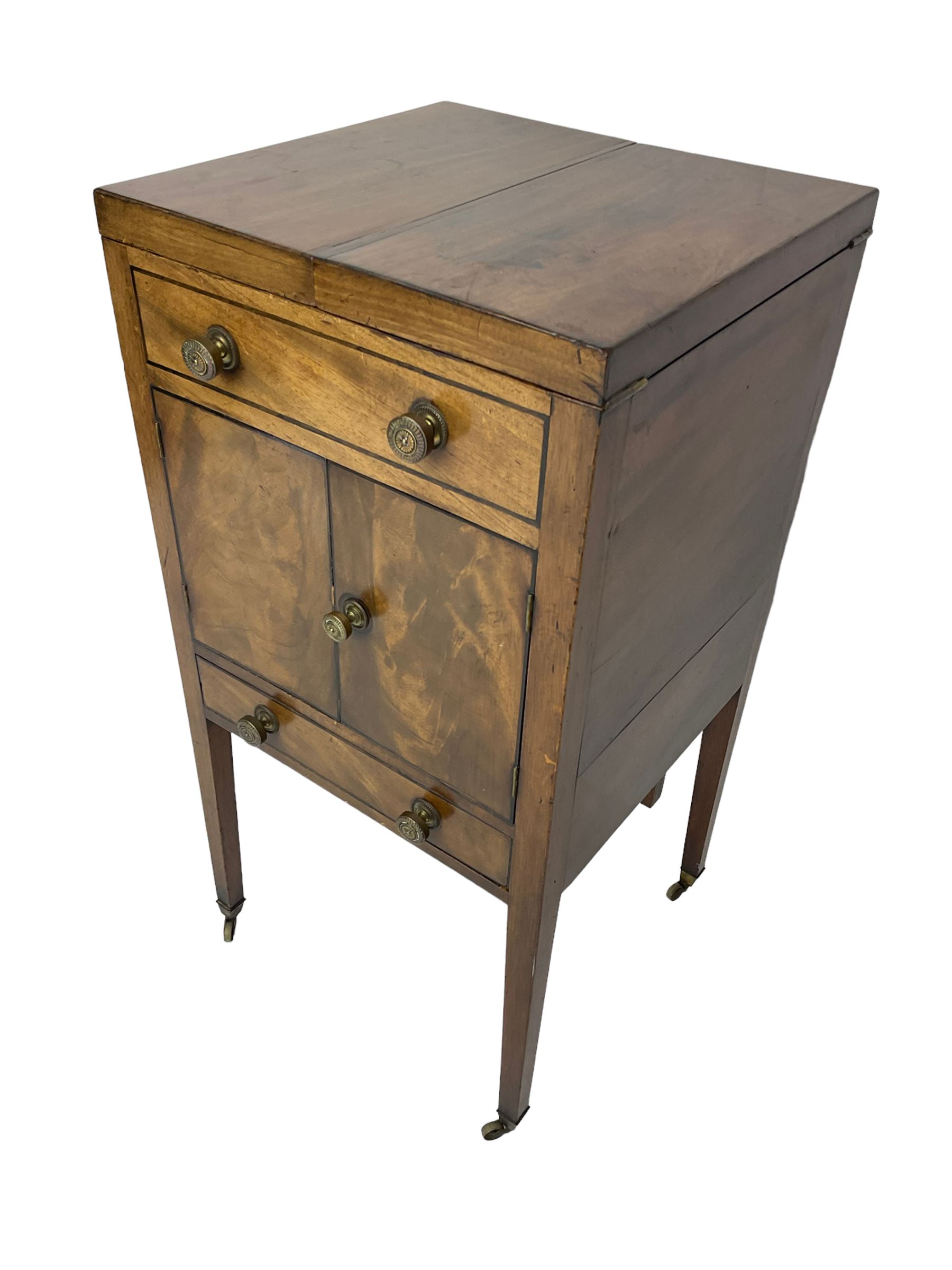 Georgian mahogany washstand cabinet, the double hinged lid opens to reveal wash basin and lift up tilting mirror, false drawer over double cupboard and drawer, on square supports with brass cups and castors