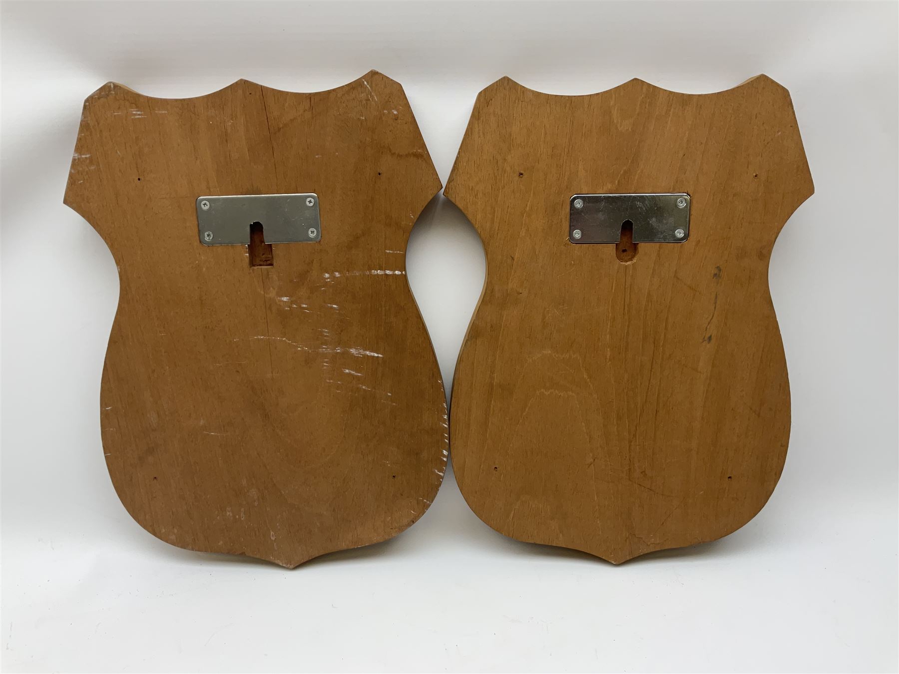 Five wooden shield plaques for mounting taxidermy of various sizes, largest H67cm, D51cm. 