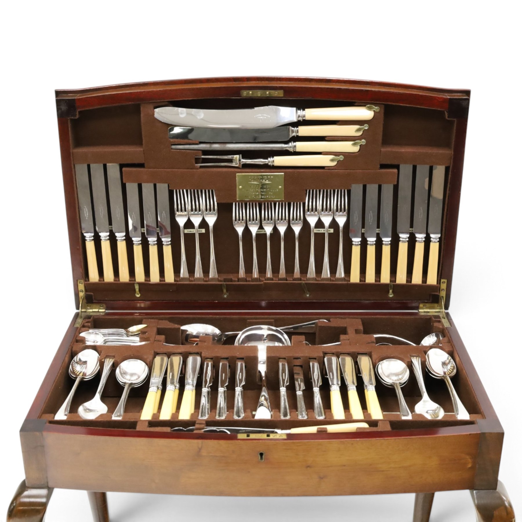 Canteen of plated Elkington Monarchy cutlery in mahogany table stand on cabriole legs W67cm