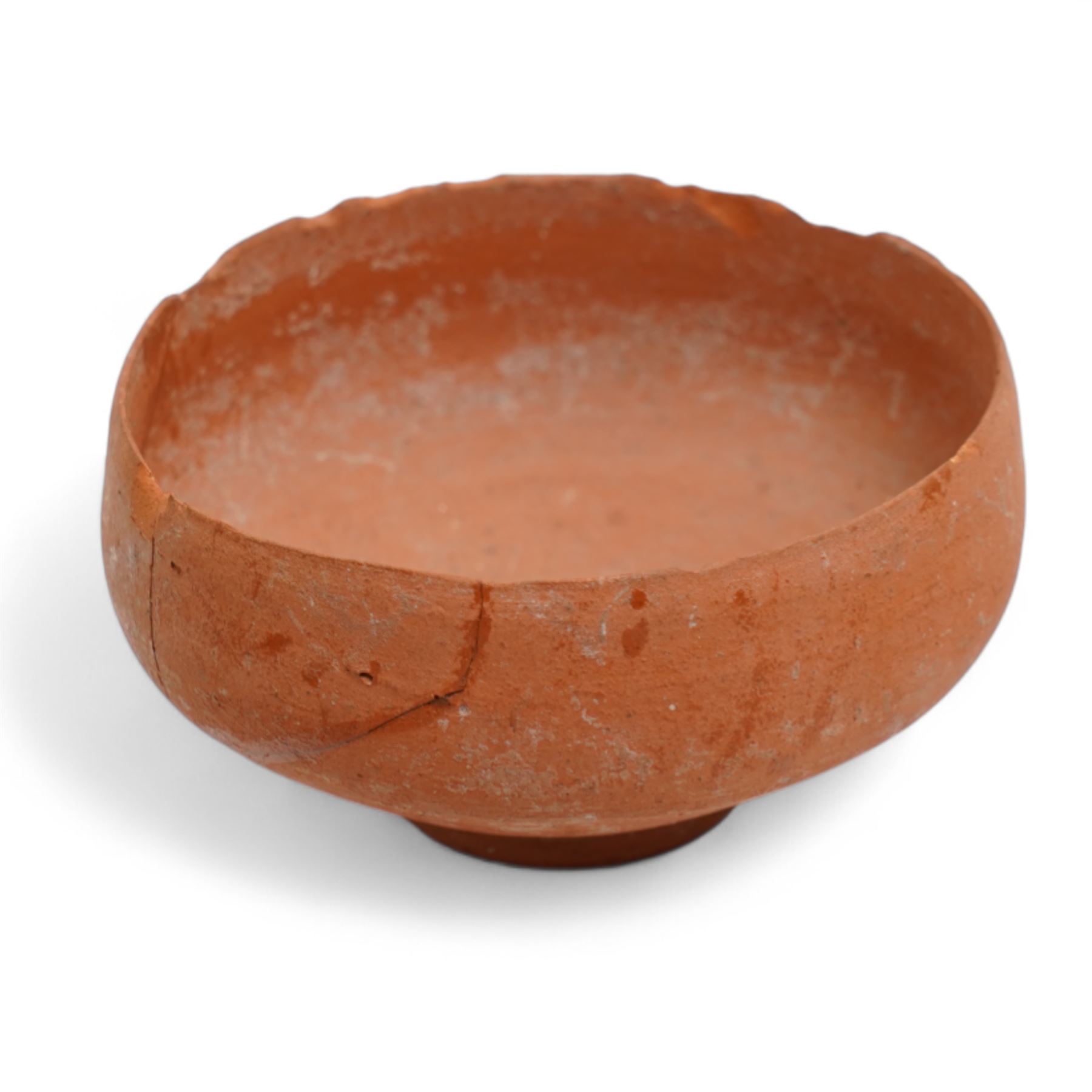 A group of eight ancient terracotta vessels - Near East and Eastern Mediterranean c.2nd millennium BC-1st century AD, comprising a Nabataean red terracotta ‘eggshell’ bowl (c.1st century BC-1st century AD) finely wheel-made with a thin-walled hemispherical form and pale red slip; a Near Eastern black-burnished spouted vessel (c.1800-1600 BC) of globular form with single handle and short spout; large Roman or Late Iron Age single-handled jug (c.1st century BC-1st century AD) wheel-made with a wide neck and ovoid body; together with five further vessels including shallow dishes, squat jars and a ribbed bottle, likely of Middle Bronze Age Levantine and Roman provincial types.
Provenance: By the vendor’s repute, acquired/collected in the Middle East (Dead Sea area/Syria) in the 1960s